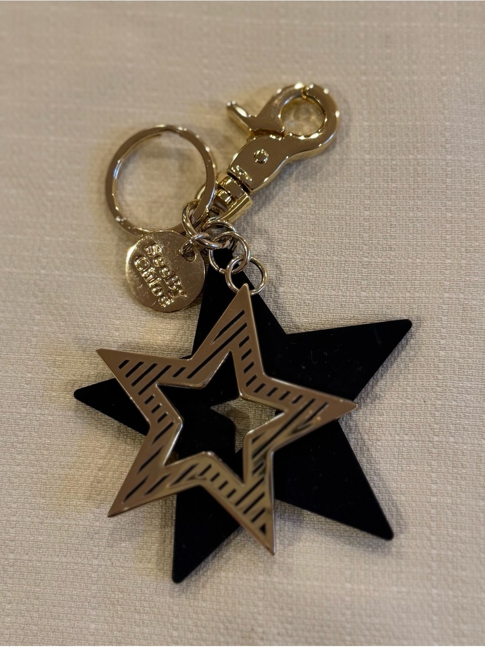 See By Chloe Black and Gold Star Keychain Bag Charm